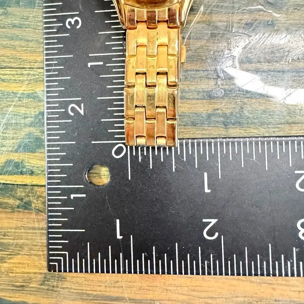 Fossil Women’s Gold Tone Quartz Watch Rose Gold Tone Dial Rhinestone Bracelet